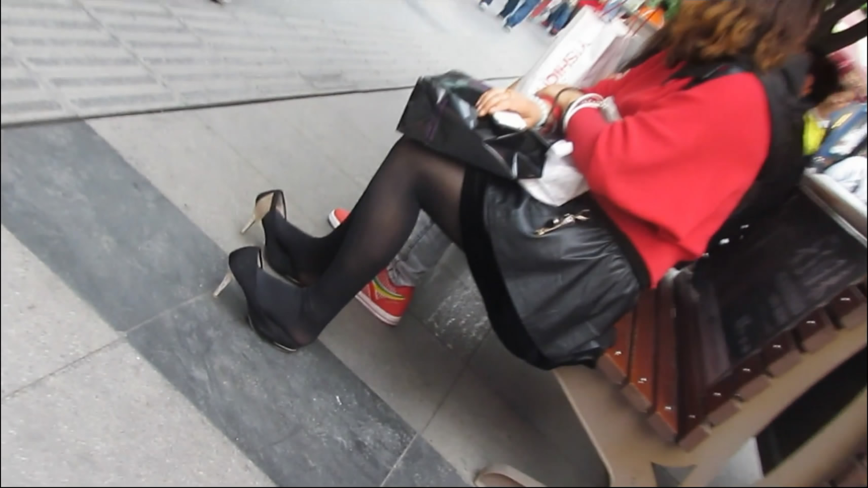Shoes facing her with her lovely feet on it